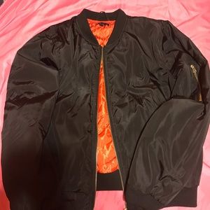 Black and orange bomber jacket